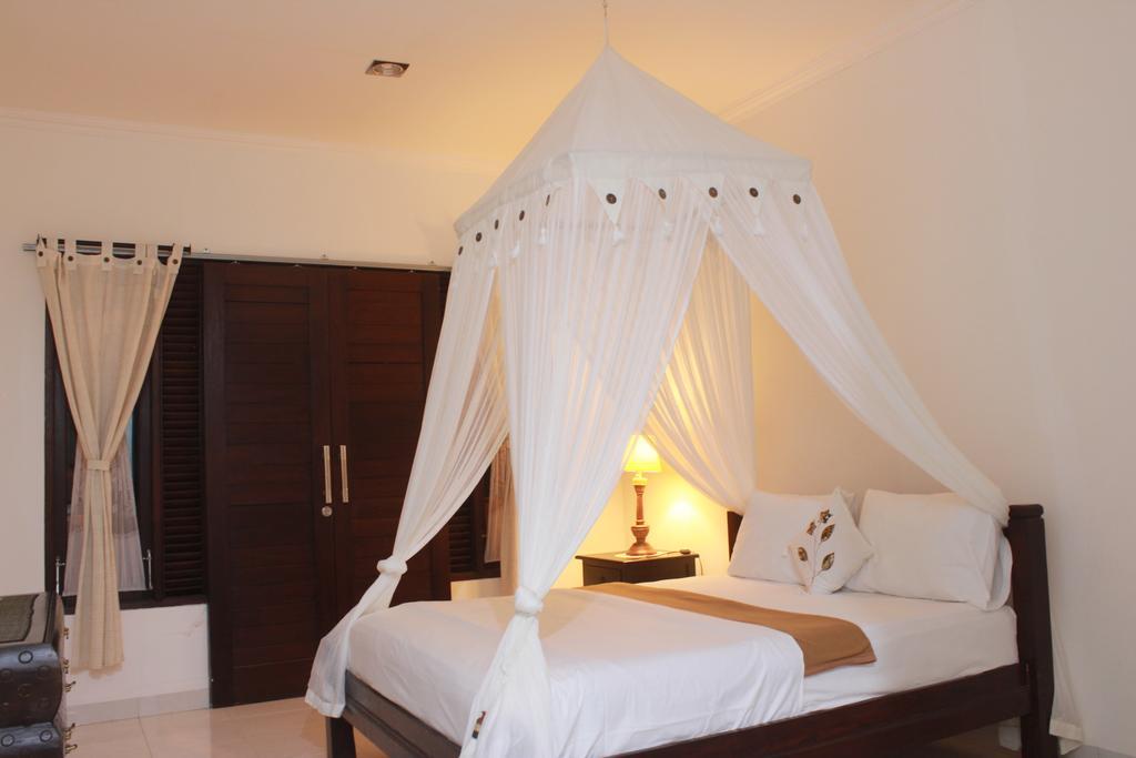 Dangin Mangkalan Homestay Мундук Номер фото