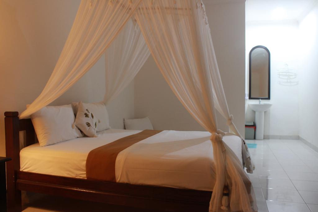 Dangin Mangkalan Homestay Мундук Номер фото