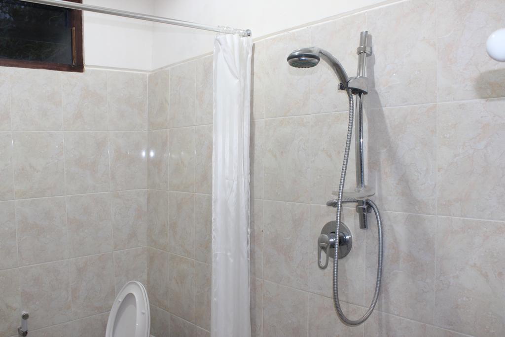 Dangin Mangkalan Homestay Мундук Номер фото